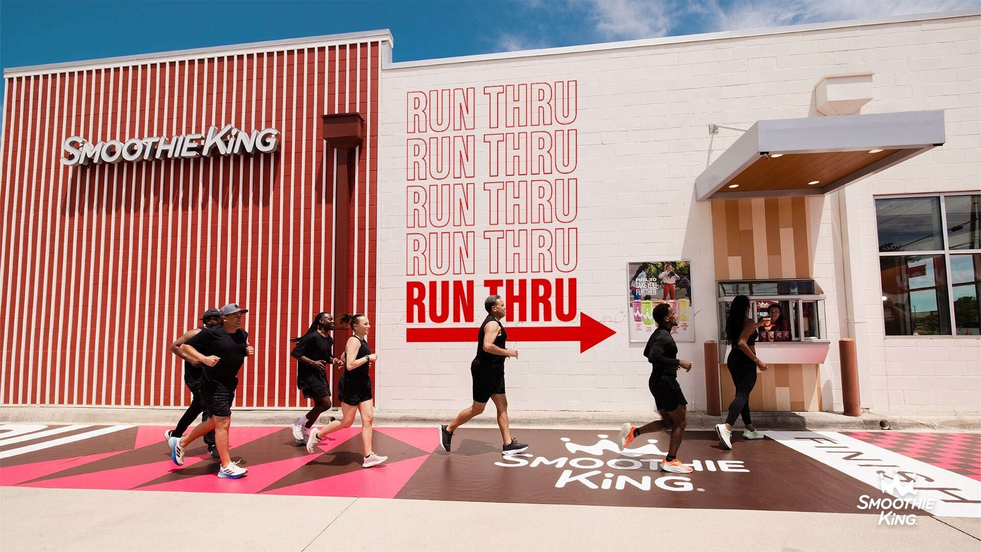 Runners passing through Smoothie King's Run-Thru